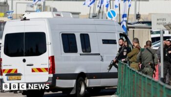 A van carrying Palestinian detainees arrives at the Israeli military prison, Ofer, in the Israeli-occupied West Bank