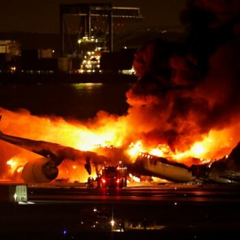 All 367 passengers escape Japan Airlines plane after fiery crash