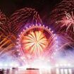 Happy New Year! Hardy Brits don't let the rain dampen their spirits as they shake off dreary weather and watch stunning firework displays to kick off 2024