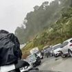Horrific moment mountain collapses in Colombia after heavy rain in landslide that killed at least 18 and injured many more