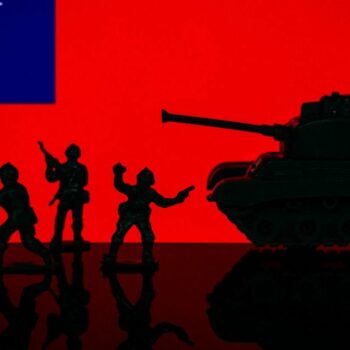 Illustration with figures of soldiers and a tank in front of a Taiwan flag displayed on a computer screen is seen in L'Aquila, Italy, on april 13, 2023. (Photo by Lorenzo Di Cola/NurPhoto) (Photo by Lorenzo Di Cola / NurPhoto / NurPhoto via AFP)