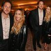 Margot Robbie gazes adoringly at husband Tom Ackerley as they make a rare public appearance at swanky Oscars reception in London