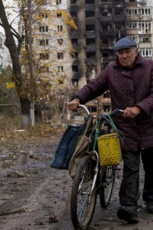 A man walks in Avdiivka