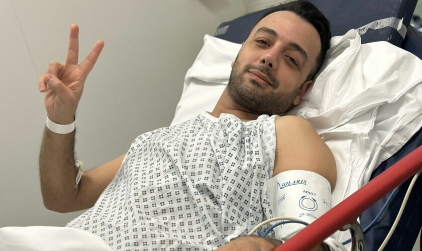 Iranian journalist shares defiant photo of himself after being stabbed in London