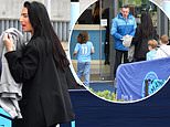 Annie Kilner hints at reconciliation with Kyle Walker as she watches the Manchester derby with their children - weeks after booting him out of the family home