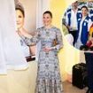 Crown Princess Victoria of Sweden unveils a portrait of herself during a visit to Asian University for Women in Bangladesh