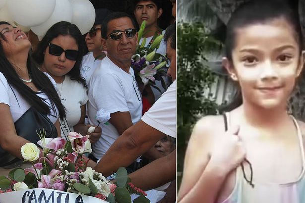 Horror scenes as mob drags woman accused of killing girl, 8, from police car, beating her to death