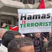 Met Police arrest man carrying 'Hamas is terrorist' placard at Gaza demo after protesters turn on him as they march through London