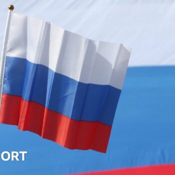 Olympic flag and Russian flag