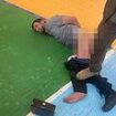 Russian forces torture Moscow terror suspect by hooking his genitals up to 80v battery leaving him foaming at the mouth - and feed another his own EAR: Battered men appear in court as new footage emerges of the slaughter that killed at least 140