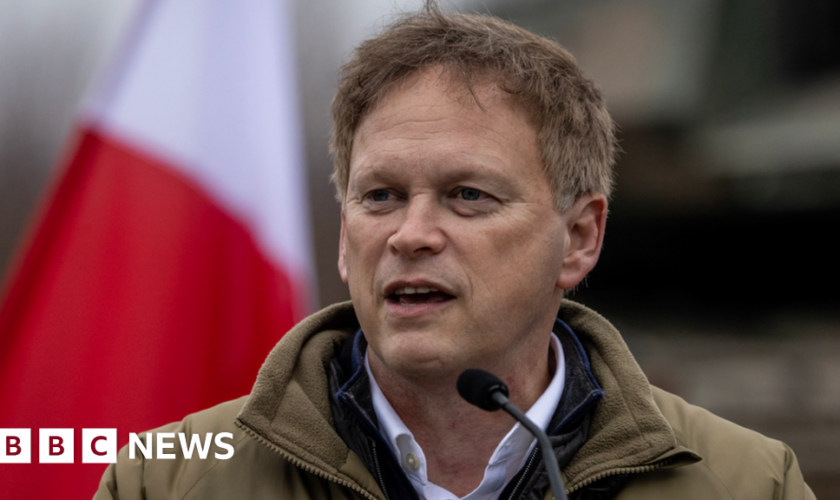 Grant Shapps speaks during a join press conference with Polish Defence Minister after their meeting on a military training compound next to Orzysz, North-Eastern Poland