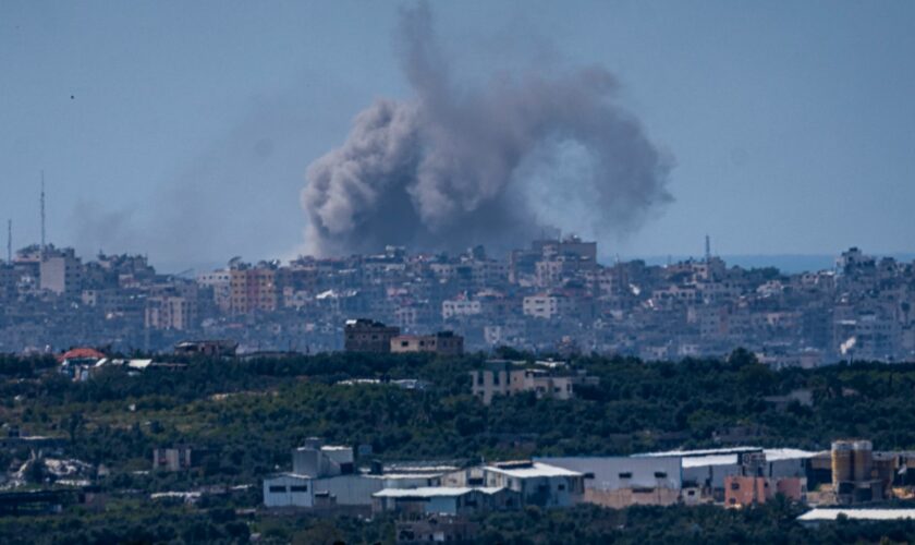 An explosion rises in the northern Gaza Strip, as seen from southern Israel. Pic: AP