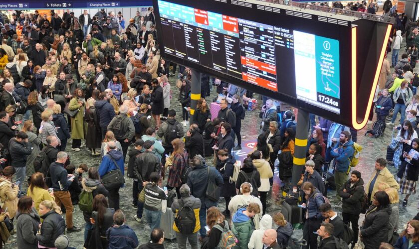 People at Euston station in London as train passengers travelling on the West Coast Main Line are suffering severe disruption because of a signalling fault at the station. Picture date: Tuesday April 2, 2024. PA Photo. See PA story RAIL Euston. Photo credit should read: Yui Mok/PA Wire