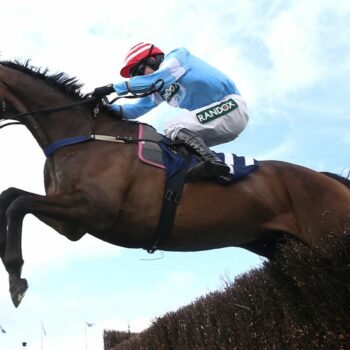 Cruz Control ridden by Stan Sheppard on their way to winning the William Hill Handicap Chase on day three of the 2024 Randox Grand National. Pic: PA