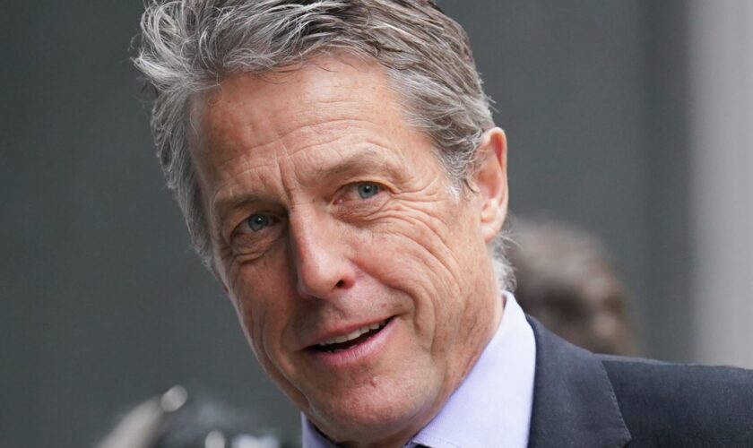 Hugh Grant arriving at the High Court in London in April last year. Pic: PA