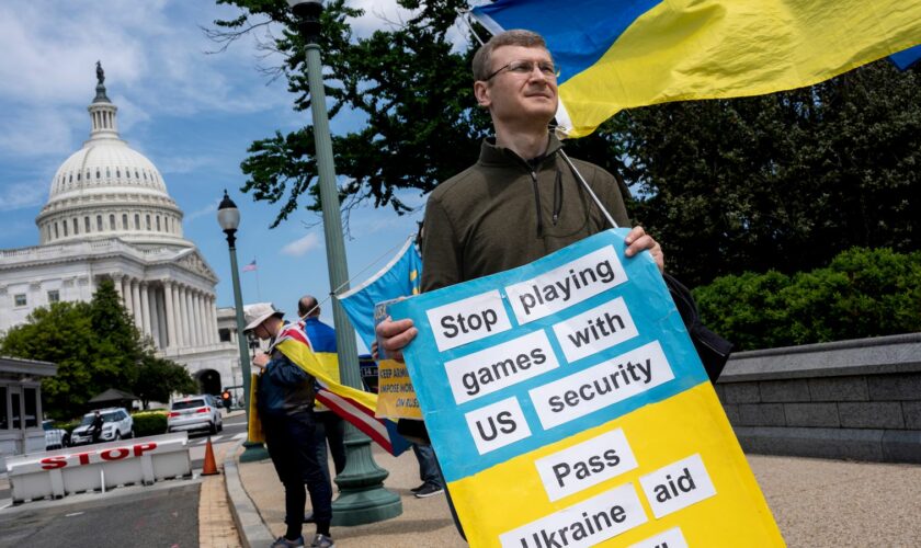 Activists supporting Ukraine demonstrate outside the Capitol in Washington. Pic: AP