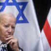 File image of Joe Biden with Israeli and American flags behind him