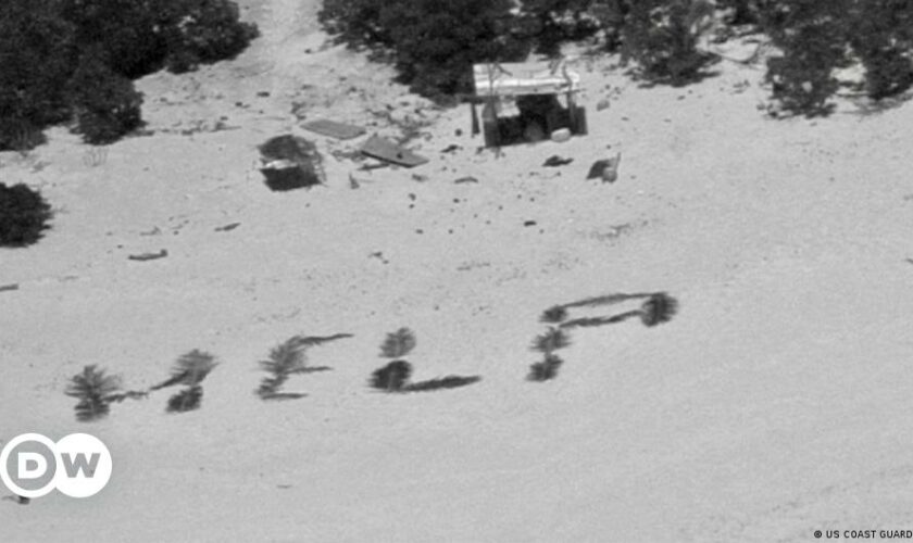 Castaways rescued after writing 'HELP' in palm fronds