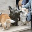 Historic moment first memorial statue to the late Queen is unveiled on what would have been her 98th birthday - featuring her beloved Corgis at her heels as real-life owners of the breed mass to pay their respects