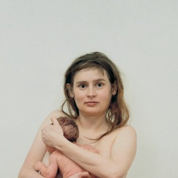 In one photo, a naked depiction of the bravery of motherhood