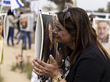 Relatives visit site of Nova music massacre as Israel marks six months since Hamas terror attack on October 7 killed 1,170 - as IDF pulls all its ground troops out of south Gaza amid international outrage over death of seven aid workers
