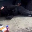 Shocking footage shows police officers wrestling 'machete-wielding' man on blood soaked South London street