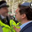 Shocking moment police officer threatens to ARREST man for 'breaching the peace' simply by being 'quite openly Jewish' near pro-Palestine march in London