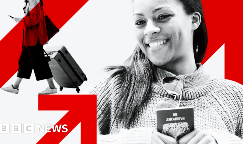 Woman holding passport and smiling at airport desk