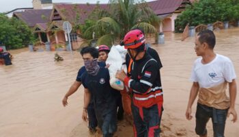 Flood and landslide hit Indonesia's Sulawesi island, killing 14
