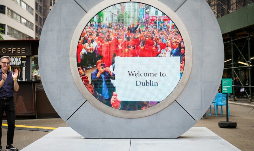 People in Dublin are seen during the reveal of The Portal,in New York City, U.S., May 8, 2024. Pic: Reuters