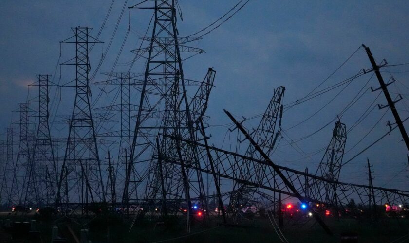 Transmission power lines down in Cypress, Texas. (Melissa Phillip/Houston Chronicle via AP)