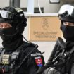 Armed police outside the court in Pezinok. Pic: AP