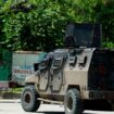 A police tank patrols the area where armed gangs have spread terror, in Port-au-Prince, Haiti, on May 24, 2024.