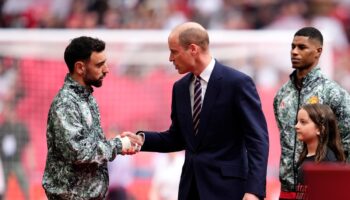 Royal news – live: Prince William attends FA Cup Final as Harry and Meghan portrait finds new home