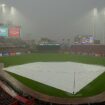 MLB grounds crew member gets trapped under tarp in rain delay