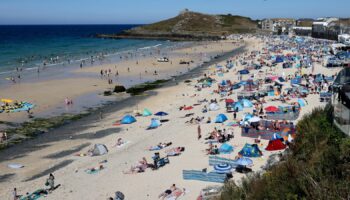 A general view of Porthmeor Beach during hot weather in St Ives, Cornwall, Britain, August 7, 2022. REUTERS/Tom Nicholson