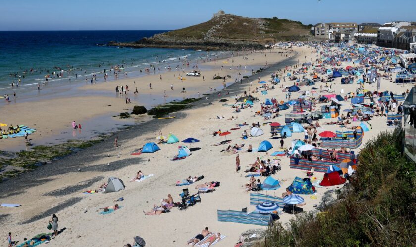 A general view of Porthmeor Beach during hot weather in St Ives, Cornwall, Britain, August 7, 2022. REUTERS/Tom Nicholson
