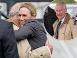 A hug for the niece! Smiling King Charles is embraced by Zara Tindall at the Royal Windsor Horse Show just days after monarch returned to official public duties following cancer diagnosis