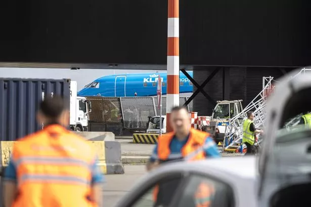 Amsterdam airport employee 'deliberately climbed into jet engine' police say after horror death