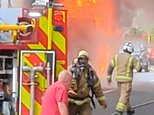 Dramatic moment London bus bursts into flames as dozens of firefighters rush to battle blaze on busy high street