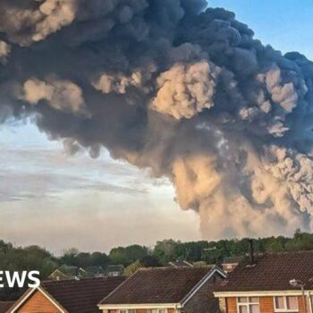 Large parcel centre fire causes huge smoke plume
