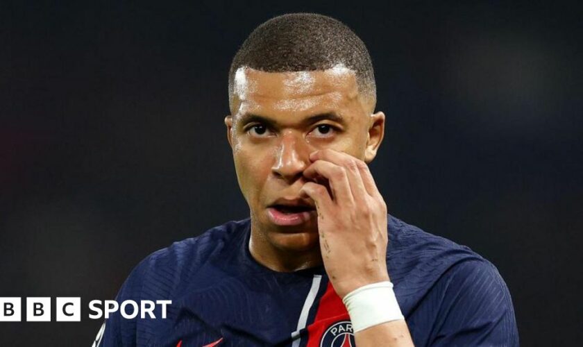 Paris St-Germain striker Kylian Mbappe looks emotional after their Champions League exit to Borussia Dortmund