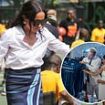Meghan Markle pays homage to her Nigerian heritage as she sports traditional skirt gifted to her during Abuja reception as she arrives in Lagos with Prince Harry - after thanking Nigerians for welcoming her to 'my country'