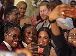 Meghan poses for sweet selfie with schoolchildren in Nigeria - while Harry pulls a funny face - after Duchess said 'I see myself in all of you' - as couple kick off three-day 'royal tour'