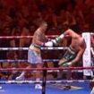 Tyson Fury STAGGERS as Oleksandr Usyk forces the Gypsy King onto the ropes for a knockdown after unloading a flurry of brutal punches... as Ukrainian fighter seals victory