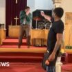 Gunman aims at pastor