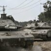 Des chars de combat Merkava de l'armée israélienne qui se déploient le long de la frontière avec la bande de Gaza, dans le sud d'Israël, le 13 octobre 2023
