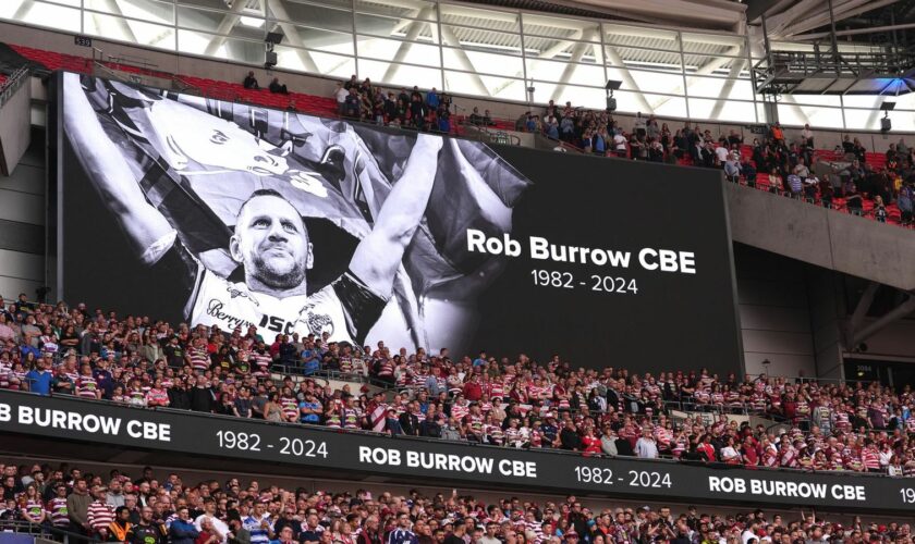 A large screen tribute to Rob Burrow at Wembley. Pic: PA