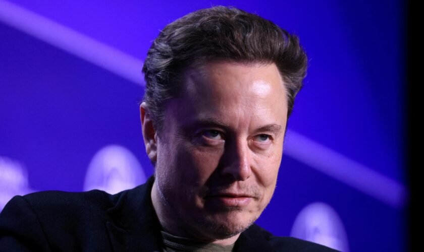 FILE PHOTO: Elon Musk, Chief Executive Officer of SpaceX and Tesla and owner of X looks on during the Milken Conference 2024 Global Conference Sessions at The Beverly Hilton in Beverly Hills, California, U.S., May 6, 2024. REUTERS/David Swanson/File Photo