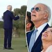 Come back for the photo, Joe! Moment Italy's Giorgia Meloni has to grab Biden, 81, after he wandered away from parachute display